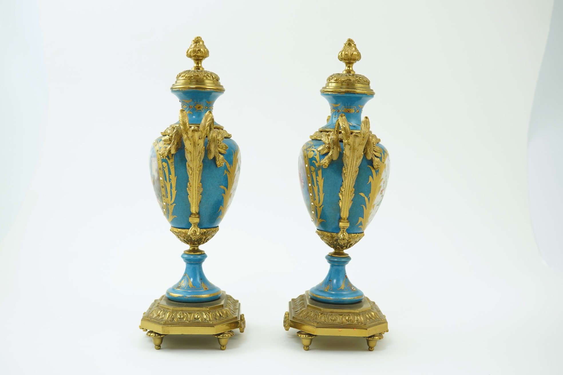 A pair of late 19th century ormolu mounted Sevres style porcelain cassolettes